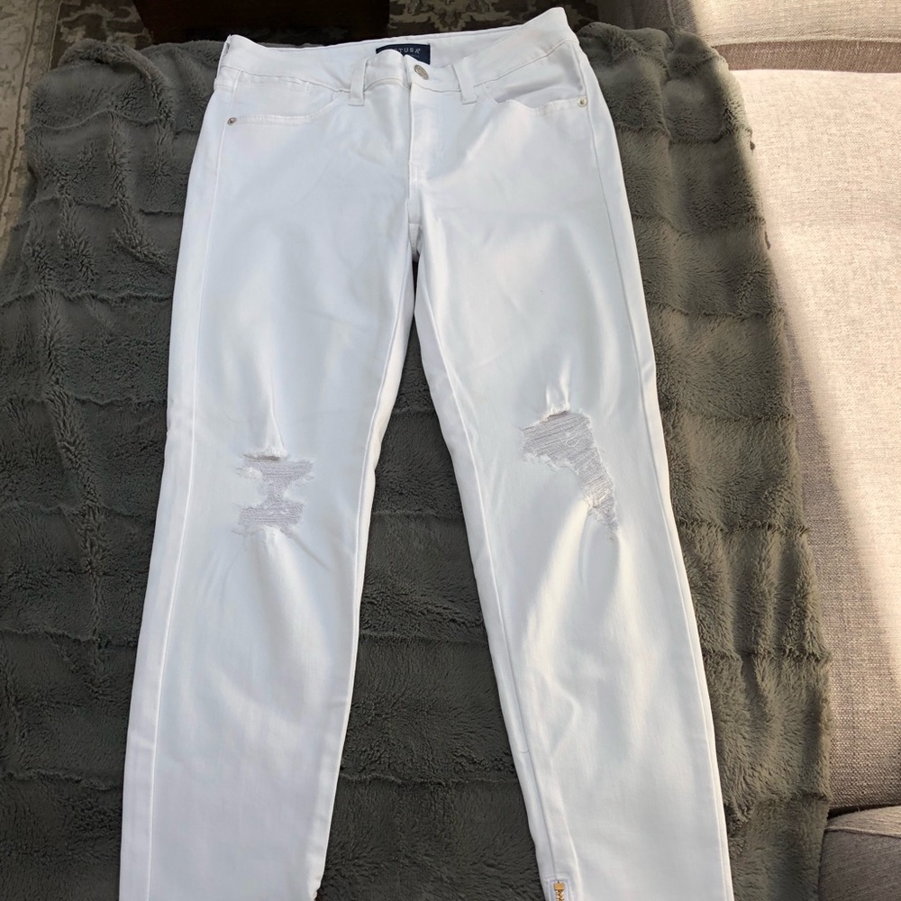 Distressed white denim
